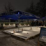 Eisstockschießen am Hauptbahnhof bei Nacht